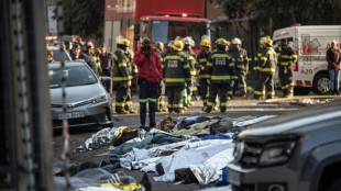 Incendie &agrave; Johannesburg: Pris au pi&egrave;ge dans un immeuble en flammes