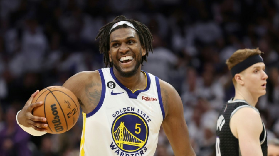 Looney's rebounding sparks Warriors into NBA second round