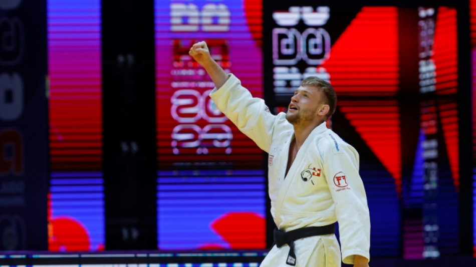 Stump lands historic world judo gold for Swiss