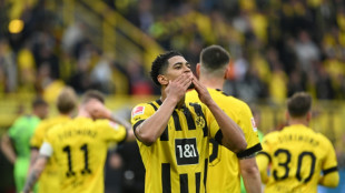 Dortmund turn to bitter rivals Schalke to keep title dream alive