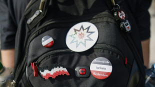 Three go on trial in Germany over plot to overthrow government