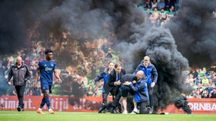 Dutch game abandoned after nine minutes as smoke bombs thrown