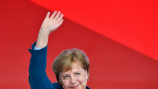 Merkel recorda sem remorsos a crise dos refugiados e as relações com a Rússia