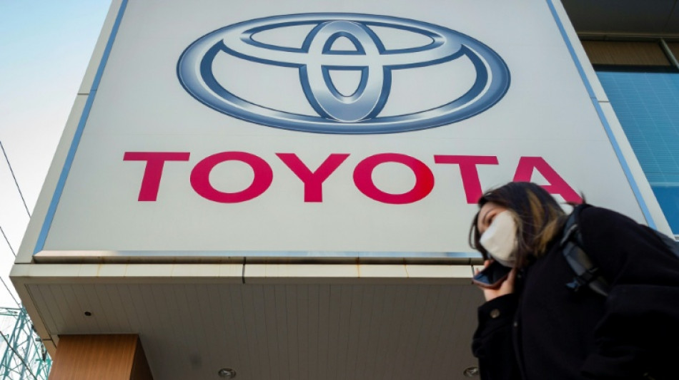Toyota names new CEO, hikes profit forecasts