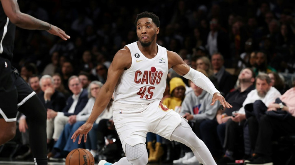 Sixers into playoffs after Cavs down Nets
