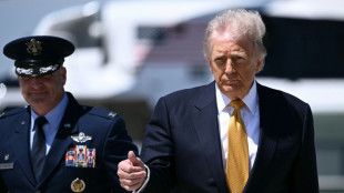 Trump arrives in China for superpower summit with Xi