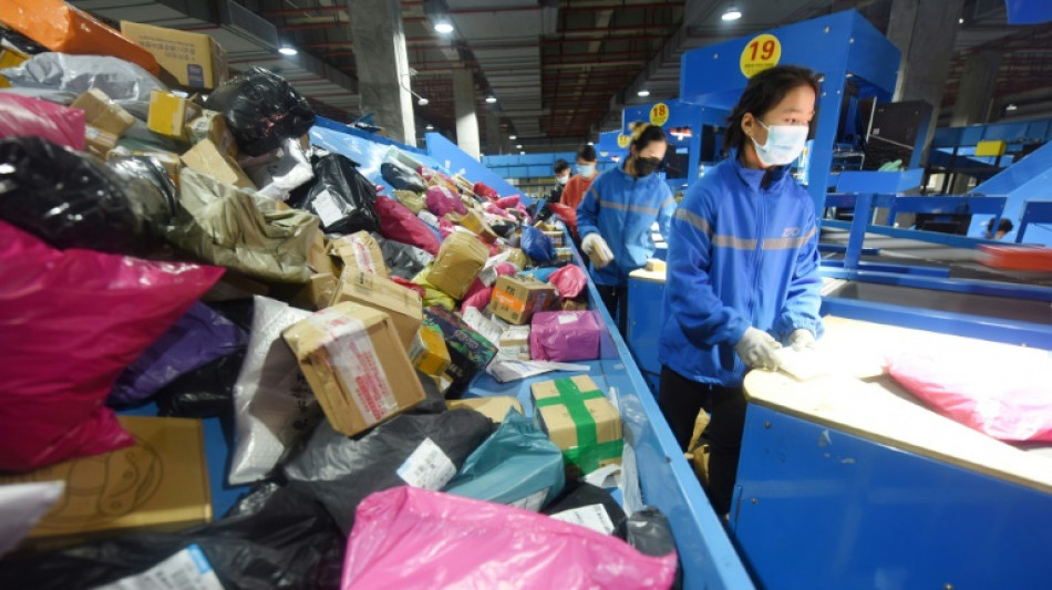 Les Chinois d&eacute;pensent des milliards lors de soldes moins euphoriques