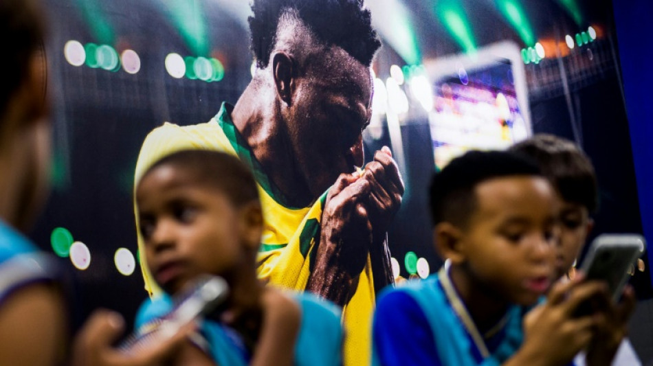 Brazil's Vinicius uses football to stimulate young Brazilian minds