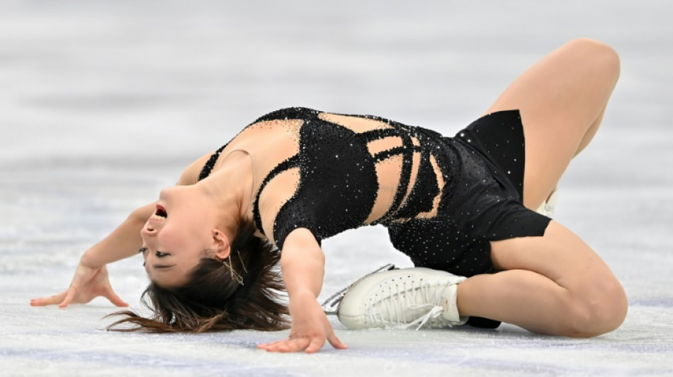Defending champion Sakamoto leads women at skating worlds