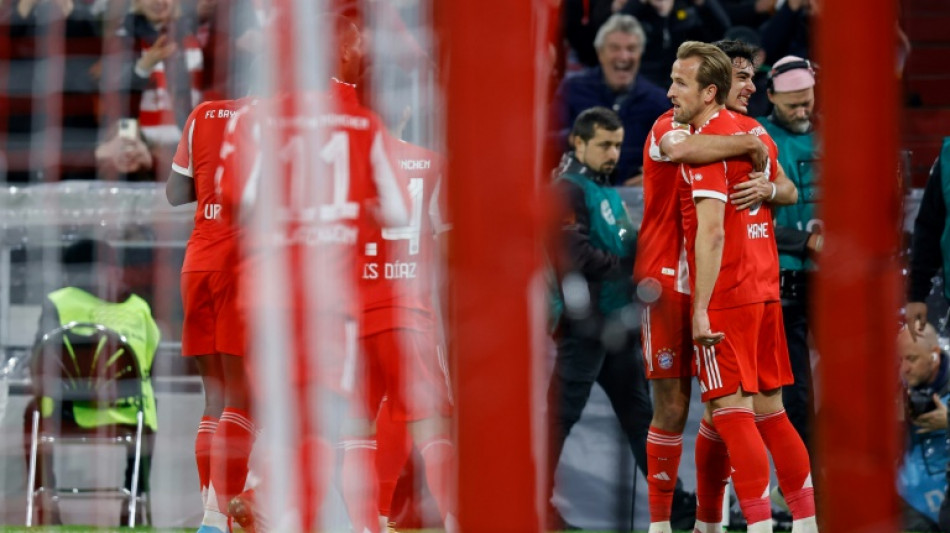 Kane strikes again as Bayern beat Dortmund to stay clear in Bundesliga