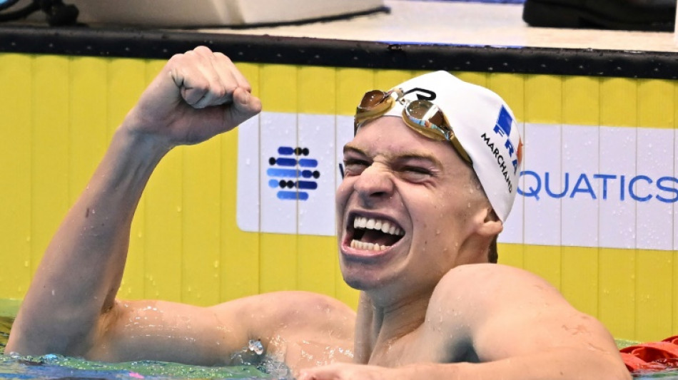 Marchand smashes Phelps's record as Titmus dominates rivals