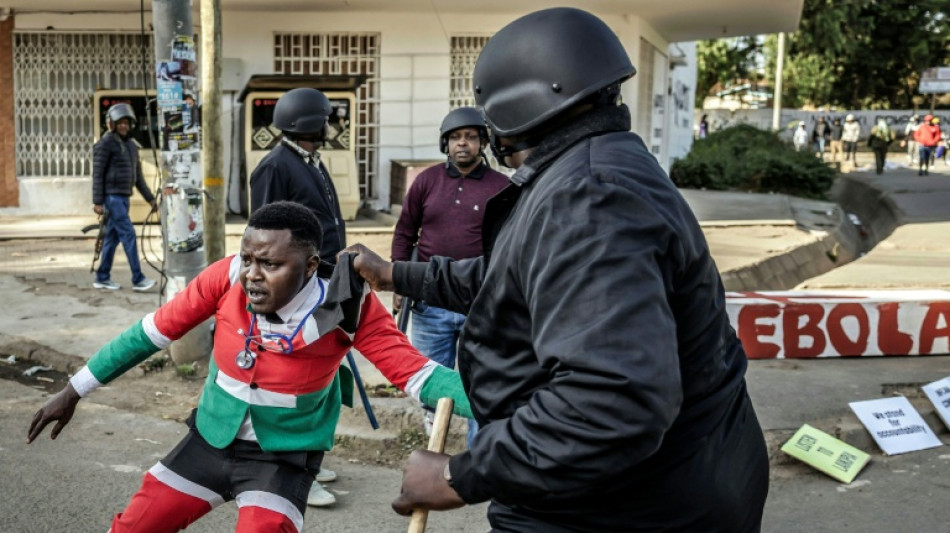 One killed as Kenyan protests at US Ebola centre turn violent