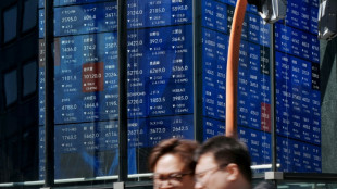 Most Asian stocks track Wall St record as US data ease rate fears